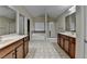 Spacious bathroom with double vanity, soaking tub, and a glass enclosed shower at 2280 Copper Trail Ln, Buford, GA 30519