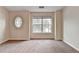 Neutral bedroom with large windows that provide plenty of natural light at 2280 Copper Trail Ln, Buford, GA 30519