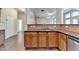 Kitchen with granite countertops, stainless appliances, and hardwood floors at 2280 Copper Trail Ln, Buford, GA 30519