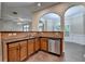 Kitchen featuring granite countertops, stainless steel appliances, and hardwood flooring at 2280 Copper Trail Ln, Buford, GA 30519