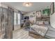 Well-decorated bedroom featuring sports memorabilia and a cozy, rustic-themed decor at 28 Rolling Rock Way, Dallas, GA 30157