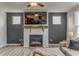 Inviting living room features fireplace, large sectional sofa, and plentiful natural light at 28 Rolling Rock Way, Dallas, GA 30157