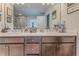 Bright main bathroom features double sinks, modern fixtures, and stylish decor at 28 Rolling Rock Way, Dallas, GA 30157