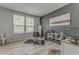 This multi-purpose room features a salon area, modern decor, neutral paint, and wood-look flooring at 28 Rolling Rock Way, Dallas, GA 30157