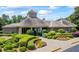 Community clubhouse with manicured landscaping, offering a welcoming space for residents at 3652 Morning Creek Ct, Suwanee, GA 30024