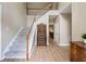 Grand two-story foyer with hardwood floors and a staircase at 3652 Morning Creek Ct, Suwanee, GA 30024