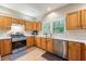 Modern kitchen featuring stainless steel appliances and ample counter space at 3652 Morning Creek Ct, Suwanee, GA 30024