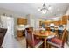 Open concept living room adjacent to the kitchen area at 3652 Morning Creek Ct, Suwanee, GA 30024