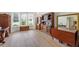 Well-lit living room showcasing hardwood floors, decorative furniture, and large windows offering natural light at 3652 Morning Creek Ct, Suwanee, GA 30024