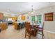 Large living room with bar stool seating by the kitchen area at 3652 Morning Creek Ct, Suwanee, GA 30024