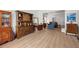 Spacious living room features hardwood floors, comfortable furnishings, and a view of the open-concept layout at 3652 Morning Creek Ct, Suwanee, GA 30024