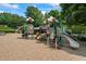 Inviting community playground with slides and climbing structures, perfect for outdoor fun and recreation at 3652 Morning Creek Ct, Suwanee, GA 30024