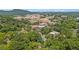Aerial view showing the neighborhood, landscape, and close proximity to nearby businesses and landmarks at 583 Etowah Ne Dr, Marietta, GA 30060