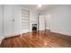 This bedroom features hardwood floors and an in-room fireplace at 583 Etowah Ne Dr, Marietta, GA 30060