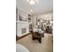 Open-concept living space with a view of the kitchen, featuring modern furnishings, hardwood floors, and a bright, inviting atmosphere at 583 Etowah Ne Dr, Marietta, GA 30060