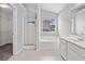 Bathroom featuring a soaking tub, glass shower and walk-in closet at 181 Ridgemont Rd, Canton, GA 30114