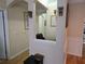 Hallway featuring architectural details and access to office and kitchen at 1850 Cotillion Dr # 2204, Atlanta, GA 30338
