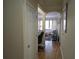 Open hallway leads to a bright living room with hardwood floors at 1850 Cotillion Dr # 2204, Atlanta, GA 30338