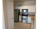 Well-equipped kitchen features stainless steel appliances and granite countertops at 1850 Cotillion Dr # 2204, Atlanta, GA 30338