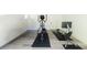 Finished basement featuring an elliptical and rowing machine for exercise at 204 Rumson Ne Rd, Atlanta, GA 30305
