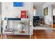 Foyer featuring hardwood floors, a mirrored console table, and view of the dining room at 204 Rumson Ne Rd, Atlanta, GA 30305