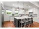 Spacious kitchen with a large island, stainless steel appliances, and a window overlooking the backyard at 204 Rumson Ne Rd, Atlanta, GA 30305
