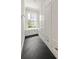 Mudroom features custom cabinets, drawers, bench, and herringbone flooring at 204 Rumson Ne Rd, Atlanta, GA 30305