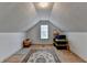 Attic storage area, offering practical space for organizing and decluttering at 2790 Meadow Gate Way, Loganville, GA 30052