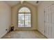 Bedroom with large arched window allowing lots of natural light at 2790 Meadow Gate Way, Loganville, GA 30052