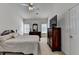 Comfortable main bedroom with vaulted ceiling, neutral tones, and a ceiling fan at 2790 Meadow Gate Way, Loganville, GA 30052