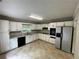 Functional kitchen with stainless steel appliances and ample counter space at 3840 Whitaker Ln, Lithia Springs, GA 30122