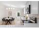 Bright renovated kitchen featuring stainless appliances, modern lighting, and white cabinets at 1010 Martin Ln, Canton, GA 30114