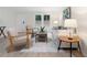 Bright living room featuring neutral decor, modern furniture and lots of natural light at 1010 Martin Ln, Canton, GA 30114