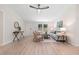 Open-concept living room with hardwood floors and great natural lighting and contemporary decor at 1010 Martin Ln, Canton, GA 30114