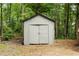 Exterior view of a backyard storage shed, perfect for storing tools and equipment at 1010 Martin Ln, Canton, GA 30114