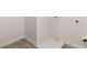 Clean basement features a utility tub, vinyl flooring, and modern electrical and plumbing hookups at 1406 Gray Branch Dr, Lawrenceville, GA 30045