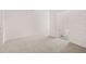 Bedroom with carpeted floors leading to a bathroom with tub and toilet at 1406 Gray Branch Dr, Lawrenceville, GA 30045