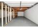 Unfinished basement with an exposed ceiling, storage shelving, and a concrete floor at 160 Pine Grove Dr, Canton, GA 30114