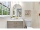Modern bathroom featuring quartz countertop, stylish fixtures, and natural light at 160 Pine Grove Dr, Canton, GA 30114