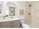 Bathroom features a modern vanity, stylish mirror, and tiled walk-in shower at 160 Pine Grove Dr, Canton, GA 30114