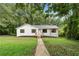 Charming home with a well-manicured front yard and a classic front porch at 160 Pine Grove Dr, Canton, GA 30114