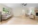 Open-concept living room with vaulted ceilings, fireplace, and contemporary furnishings at 160 Pine Grove Dr, Canton, GA 30114