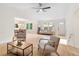 Bright living room with an open floor plan, neutral decor, and ample natural light at 160 Pine Grove Dr, Canton, GA 30114