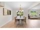 Bright living room and dining area offer an open layout and modern finishes at 160 Pine Grove Dr, Canton, GA 30114