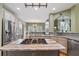 Modern kitchen featuring granite countertops, stainless steel appliances, and a kitchen island at 3130 Kates Nw Way, Kennesaw, GA 30152