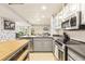 Spacious kitchen with an island and stainless steel appliances at 114 Emily Ln, Alpharetta, GA 30009