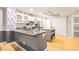 Modern kitchen with stainless steel appliances, ample counter space, and stylish backsplash at 114 Emily Ln, Alpharetta, GA 30009