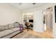 Office space with built-in shelving and adjacent seating area at 114 Emily Ln, Alpharetta, GA 30009