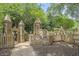Beautiful fenced-in wooden playground for children to enjoy at 114 Emily Ln, Alpharetta, GA 30009