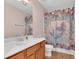 A bathroom with a single sink vanity and a mermaid-themed shower curtain at 207 Diamond Valley Pass, Canton, GA 30114